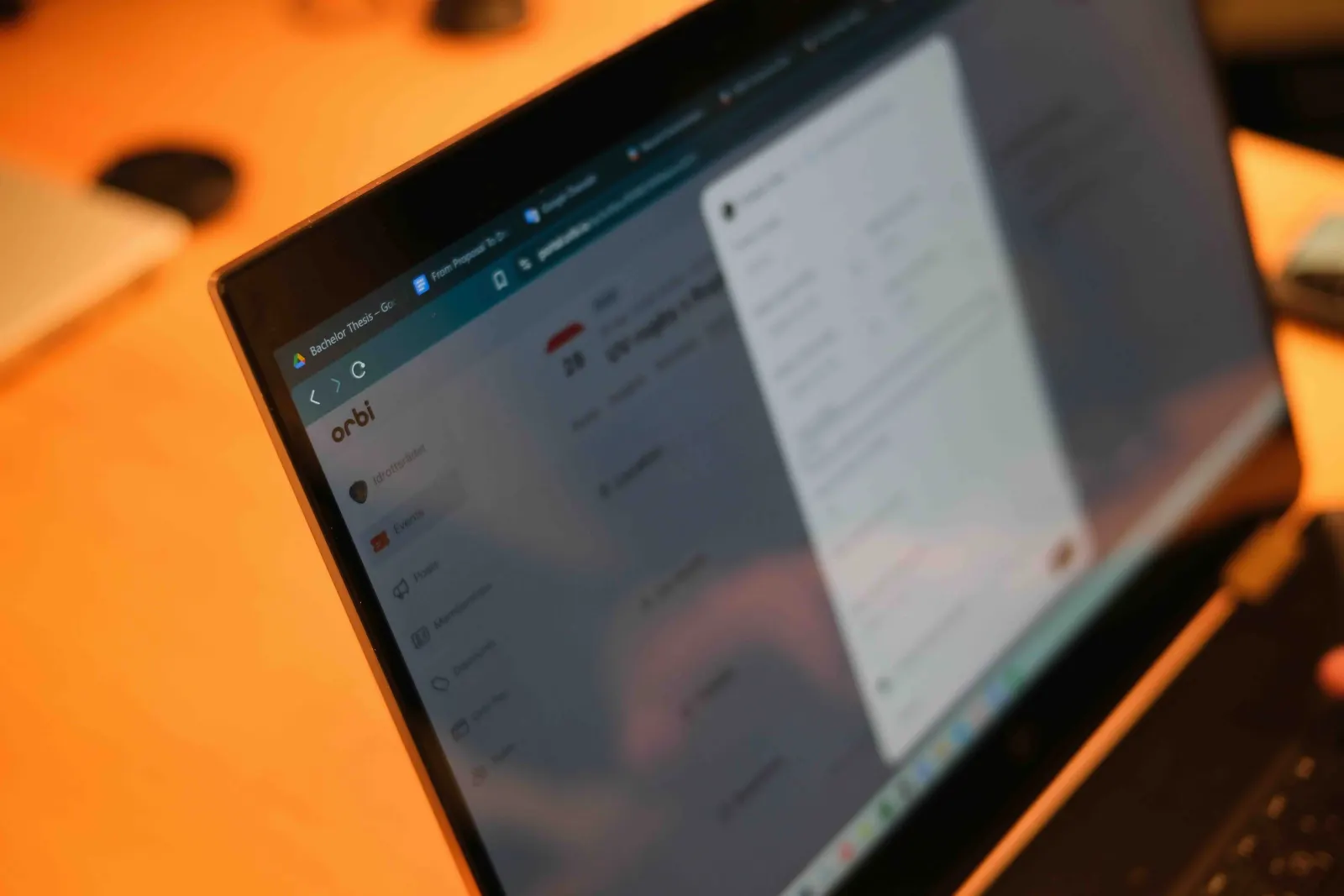A laptop showing the Orbi dashboard.